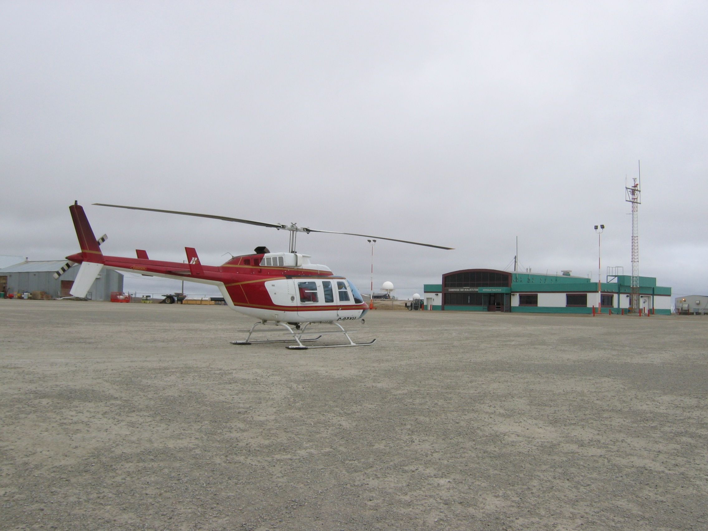 Bell 206 parked on an airport ramp